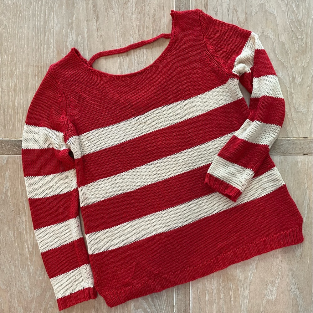 Red and white striped key hole sweater.